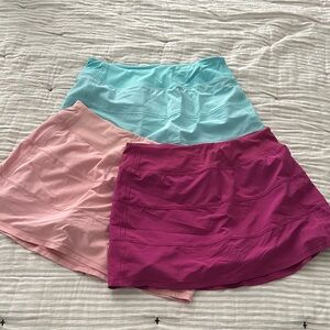 SOLD 3 CRZ Yoga athletic skirts with built in shorts